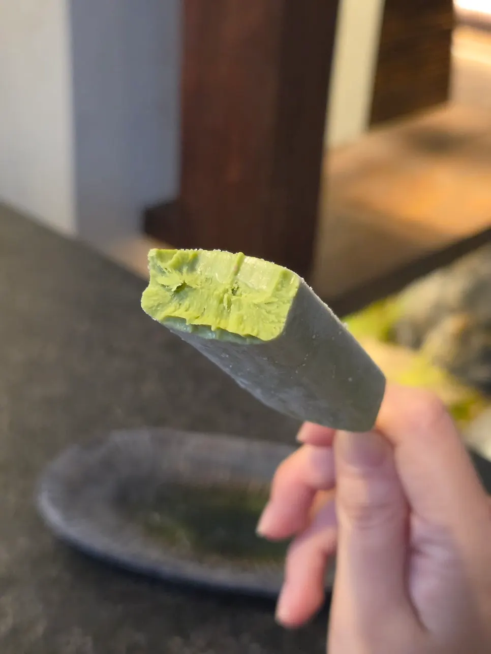 Two cups of black tea and matcha ice cream