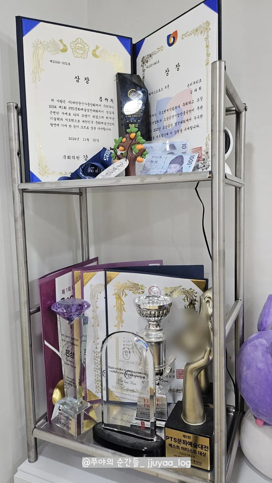 Awards and trophies displayed at On The Boutique