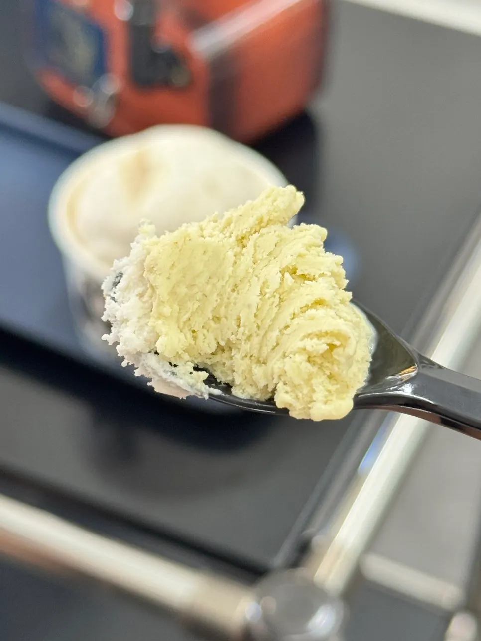 Fig Cream Cheese single cup topped with a Pistachio taster