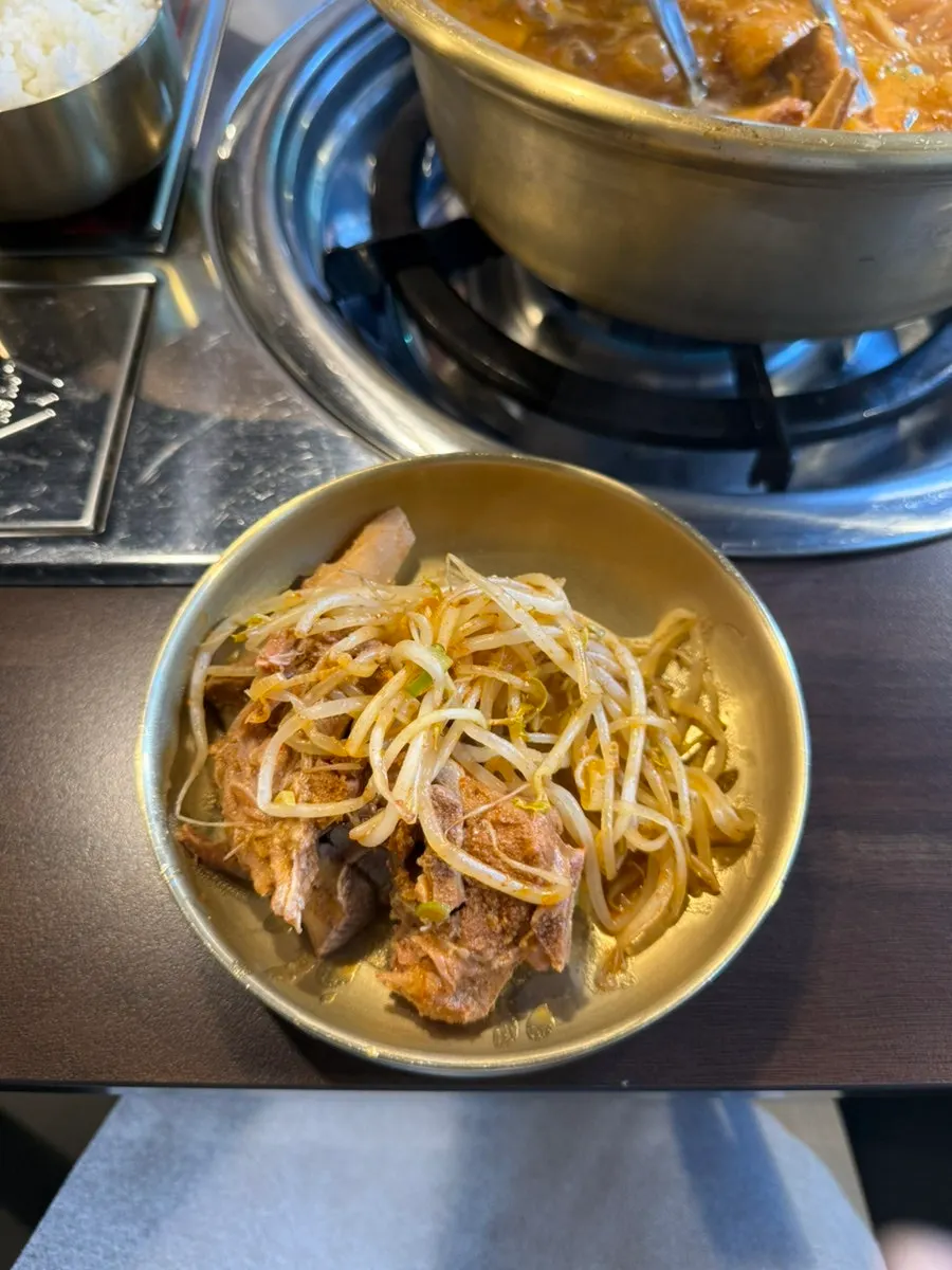 Close-up of the spicy, clear gamja jeongol broth