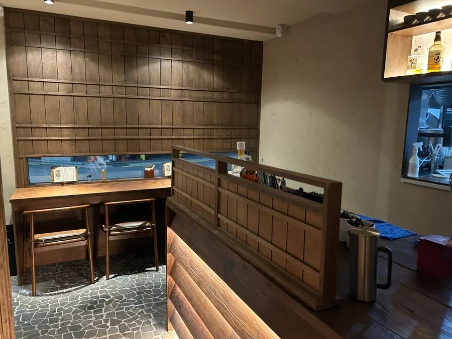 Manmok interior with generously spaced tables