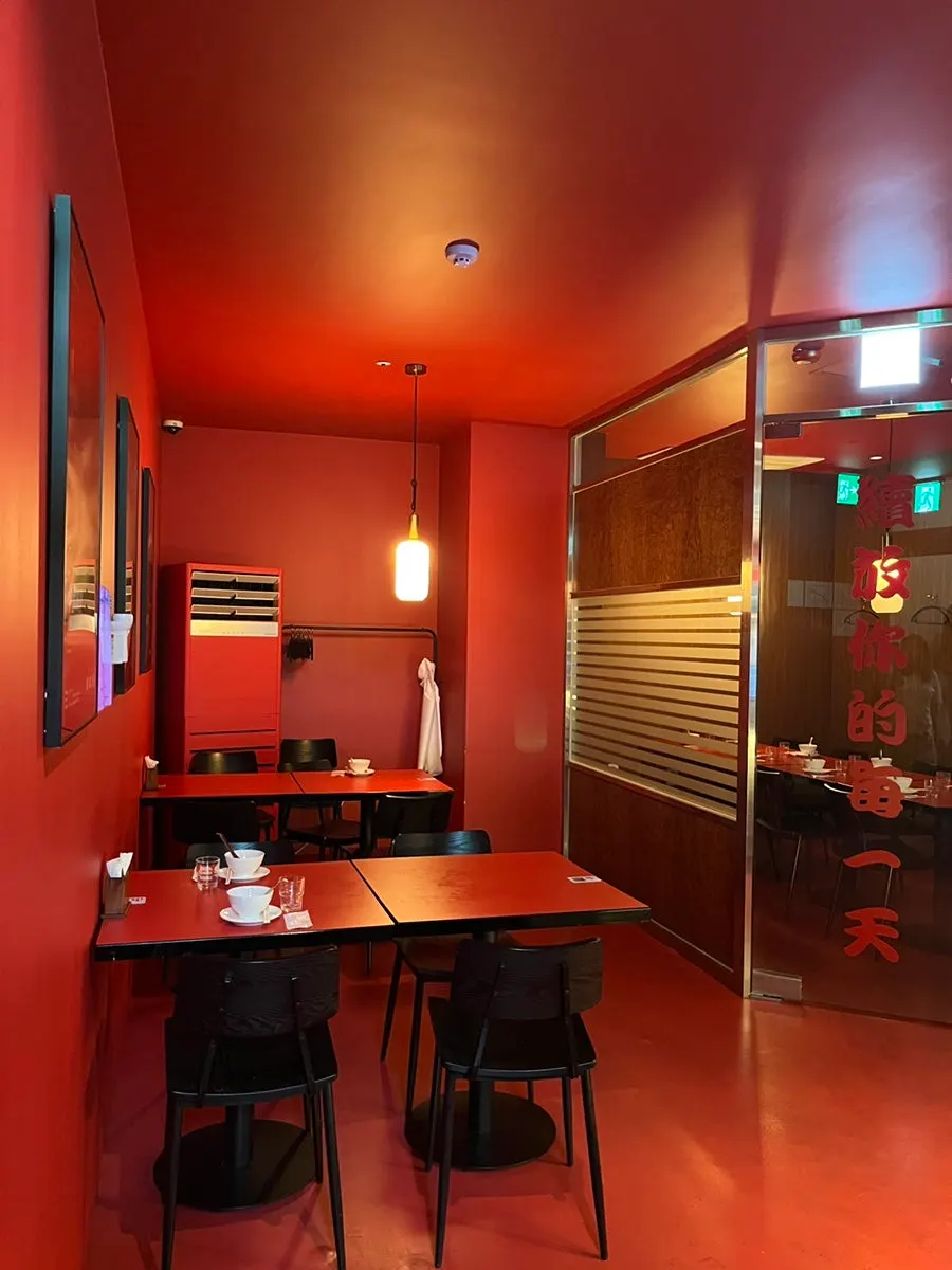 Red-toned Hong Kong-style interior of the restaurant