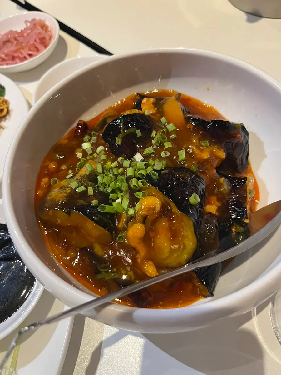 Fish-fragrant eggplant topped with ground meat and scallion