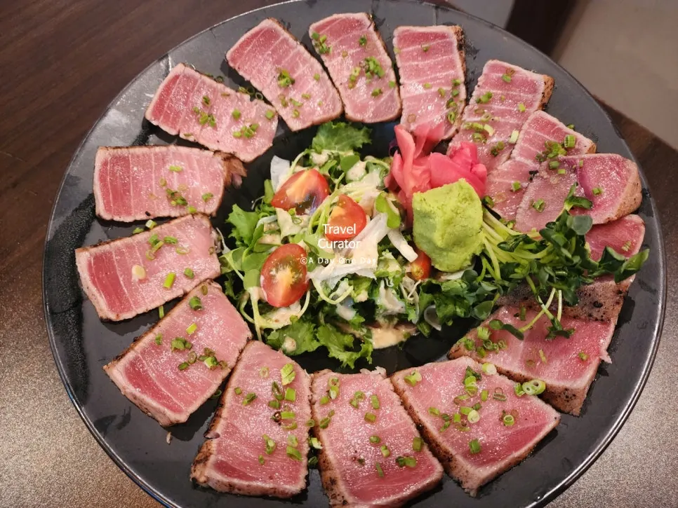 A plate of maguro tataki with lightly seared surface