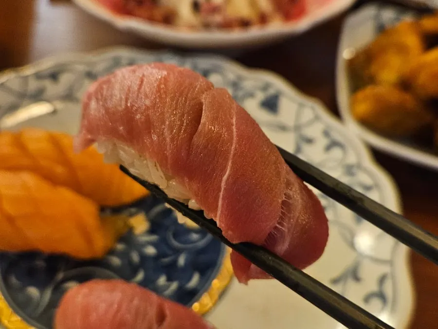 Plate of snow crab and egg sushi