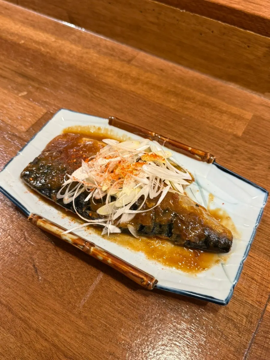 A bowl of sabamiso-ni, simmered mackerel in miso