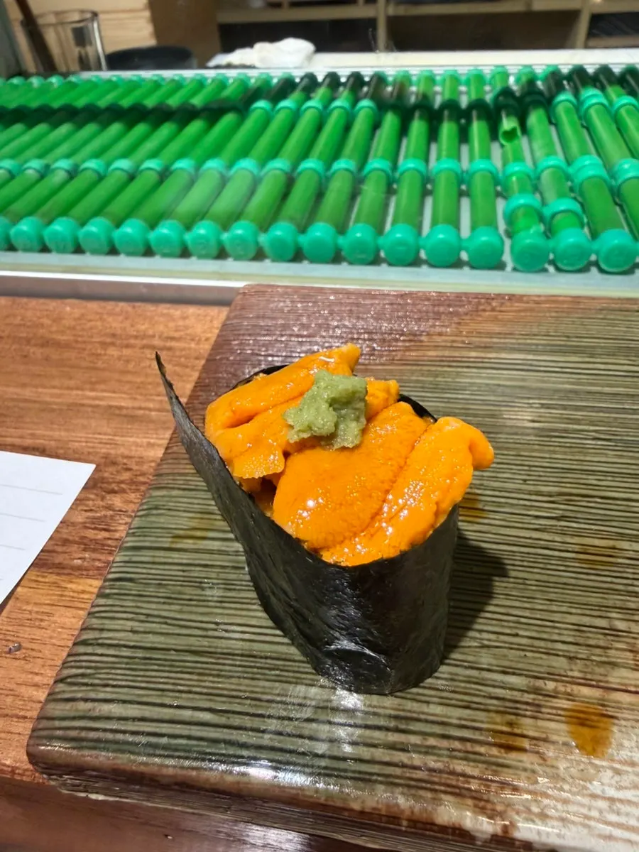 Uni sushi ordered by a friend at the table