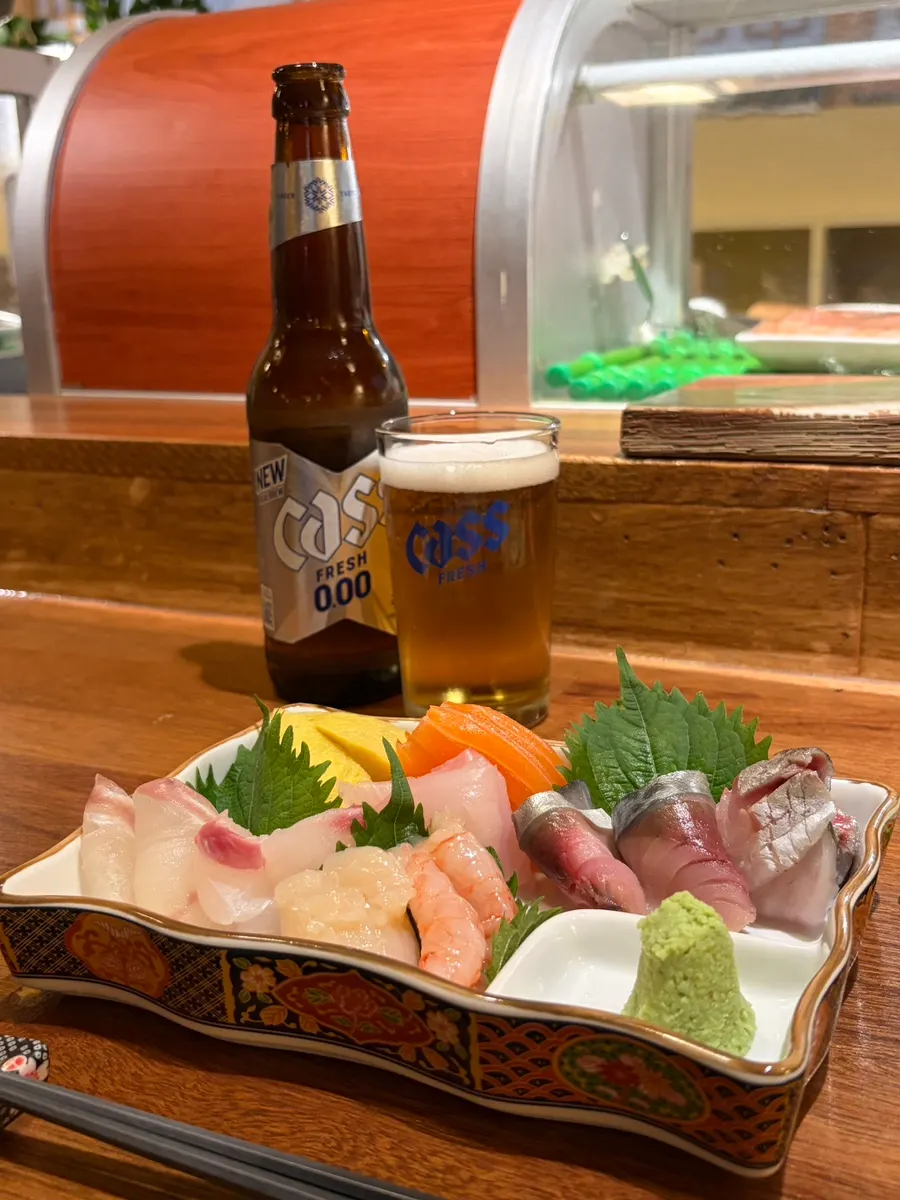 Sashimi being prepared fresh at the counter seats