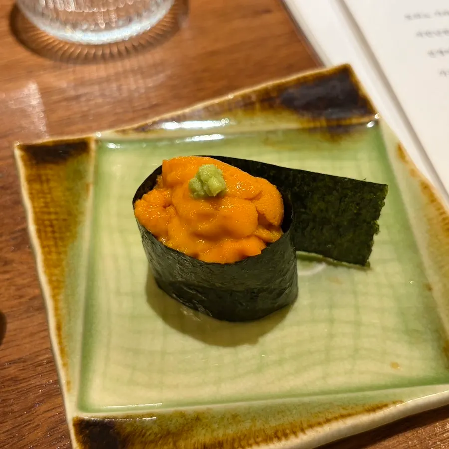 Uni nigiri topped with freshly grated wasabi