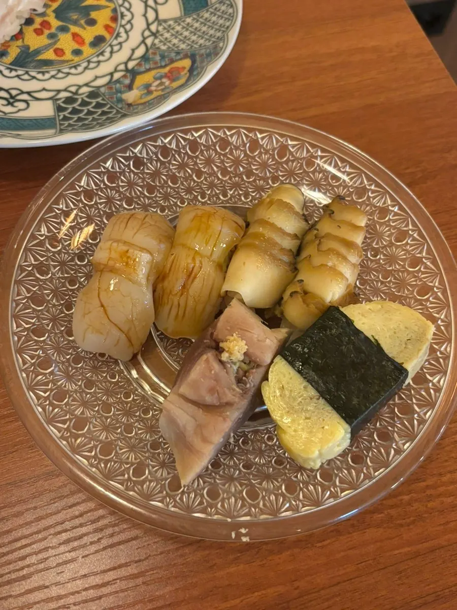 Two extra orders of uni sushi