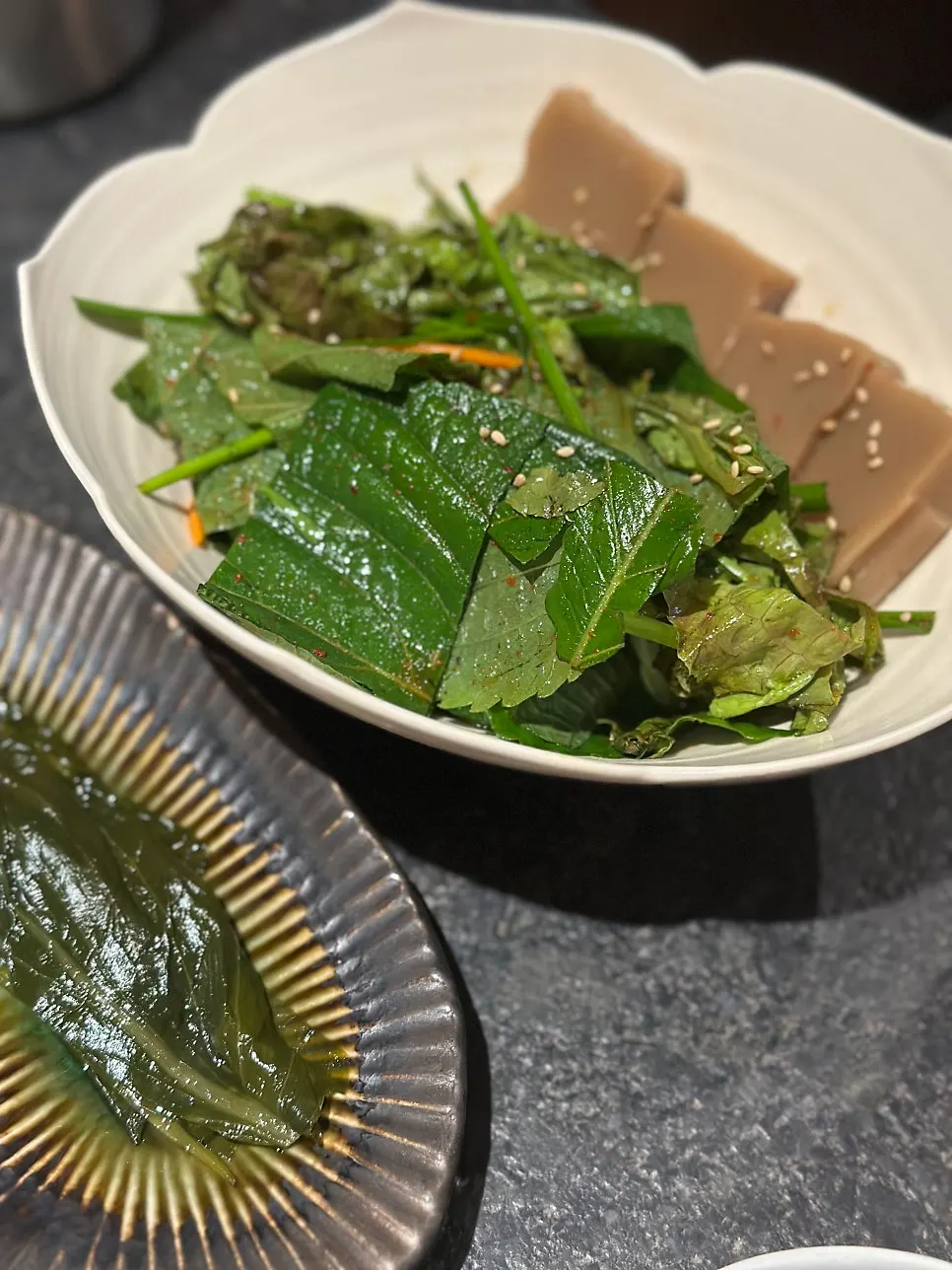 Close-up of Manmok's side dish spread
