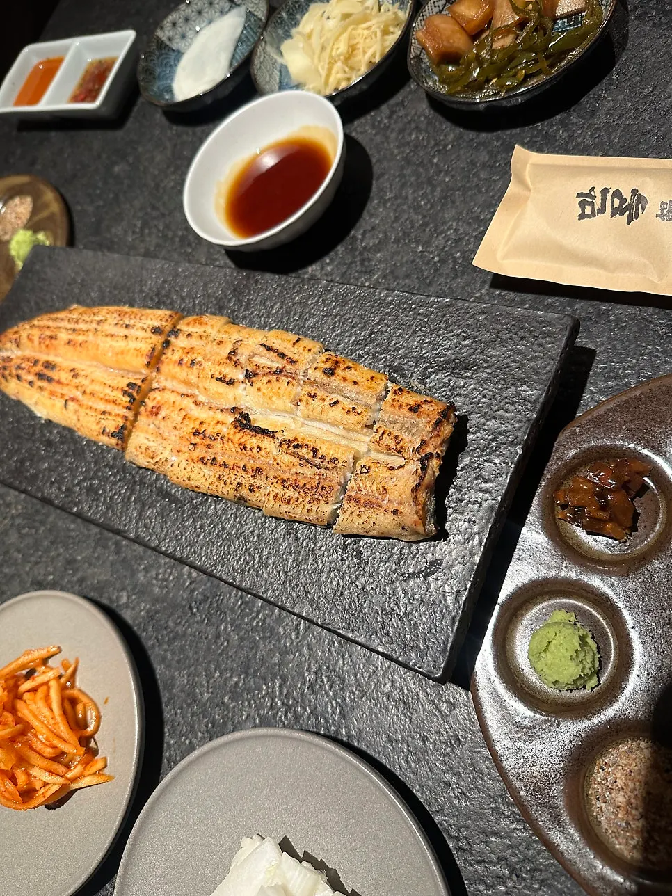 Plate of one whole grilled eel at Manmok