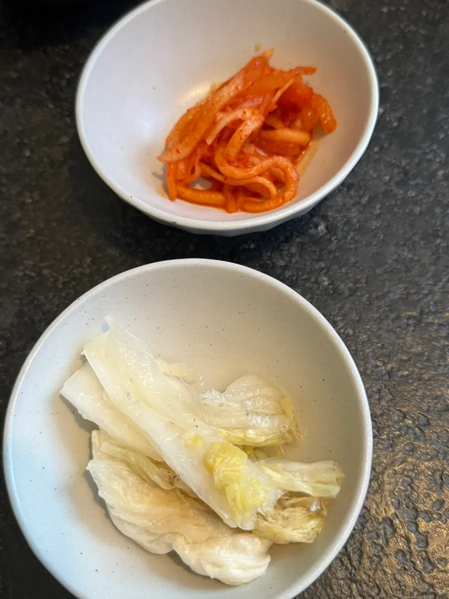 Full single-person table setting with the eel rice bowl