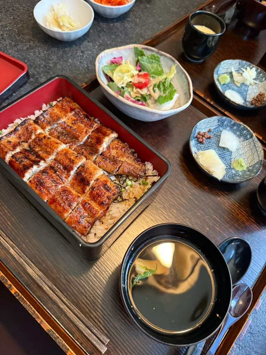 A piece of eel placed on top of the rice