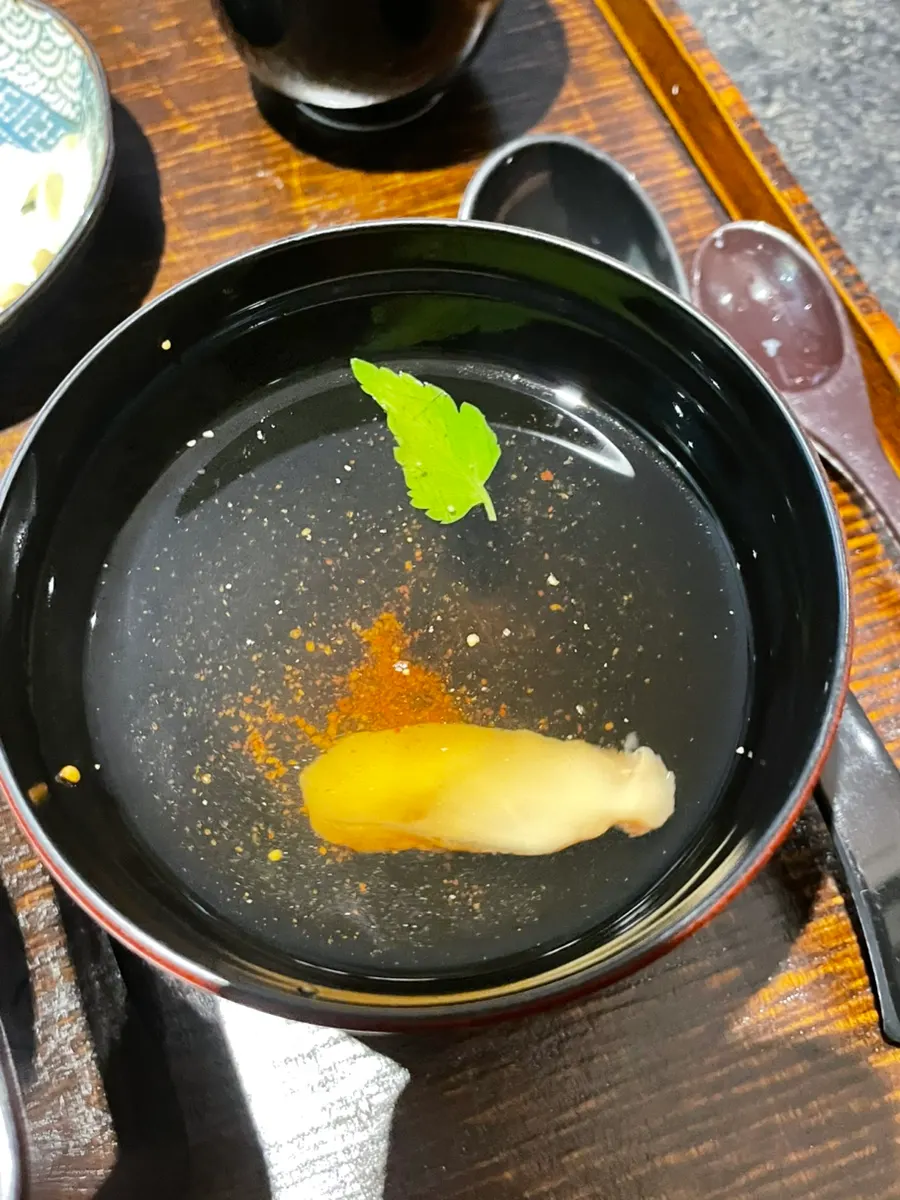A spoonful of chawanmushi with shrimp inside