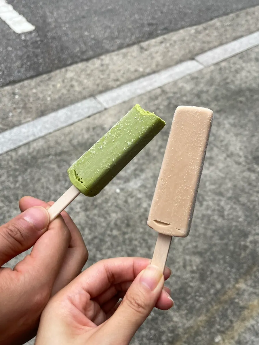 Green tea and black tea ice cream served for dessert