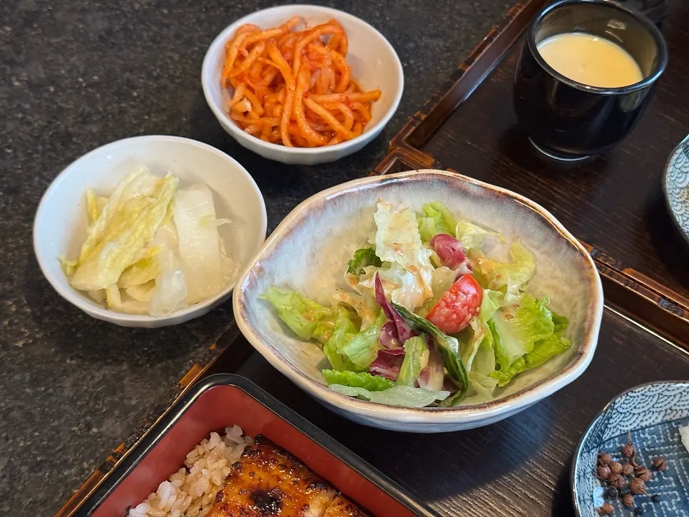 Salad, radish salad, and baek-kimchi side dishes