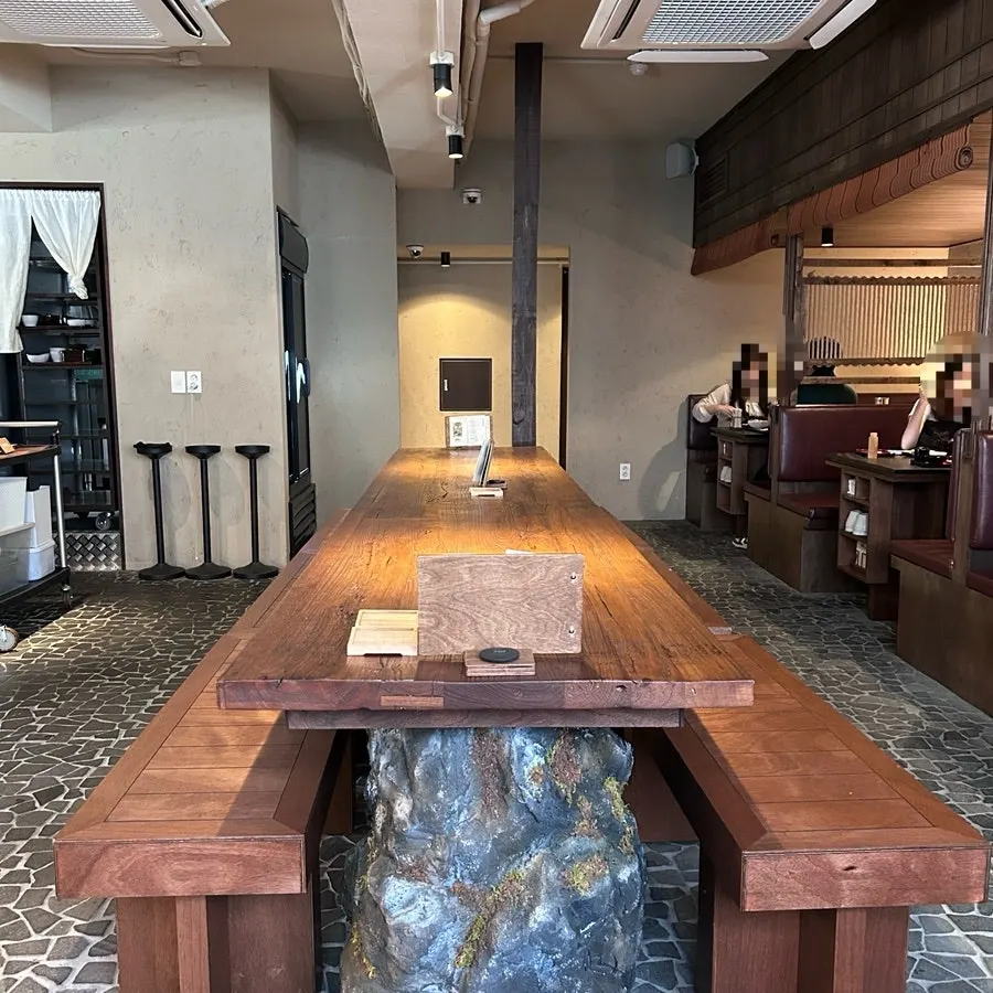 Large solid wood table for group seating
