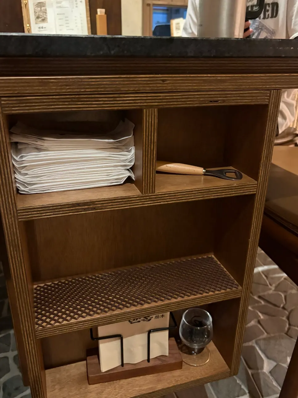 Neat wood-toned interior at Manmok