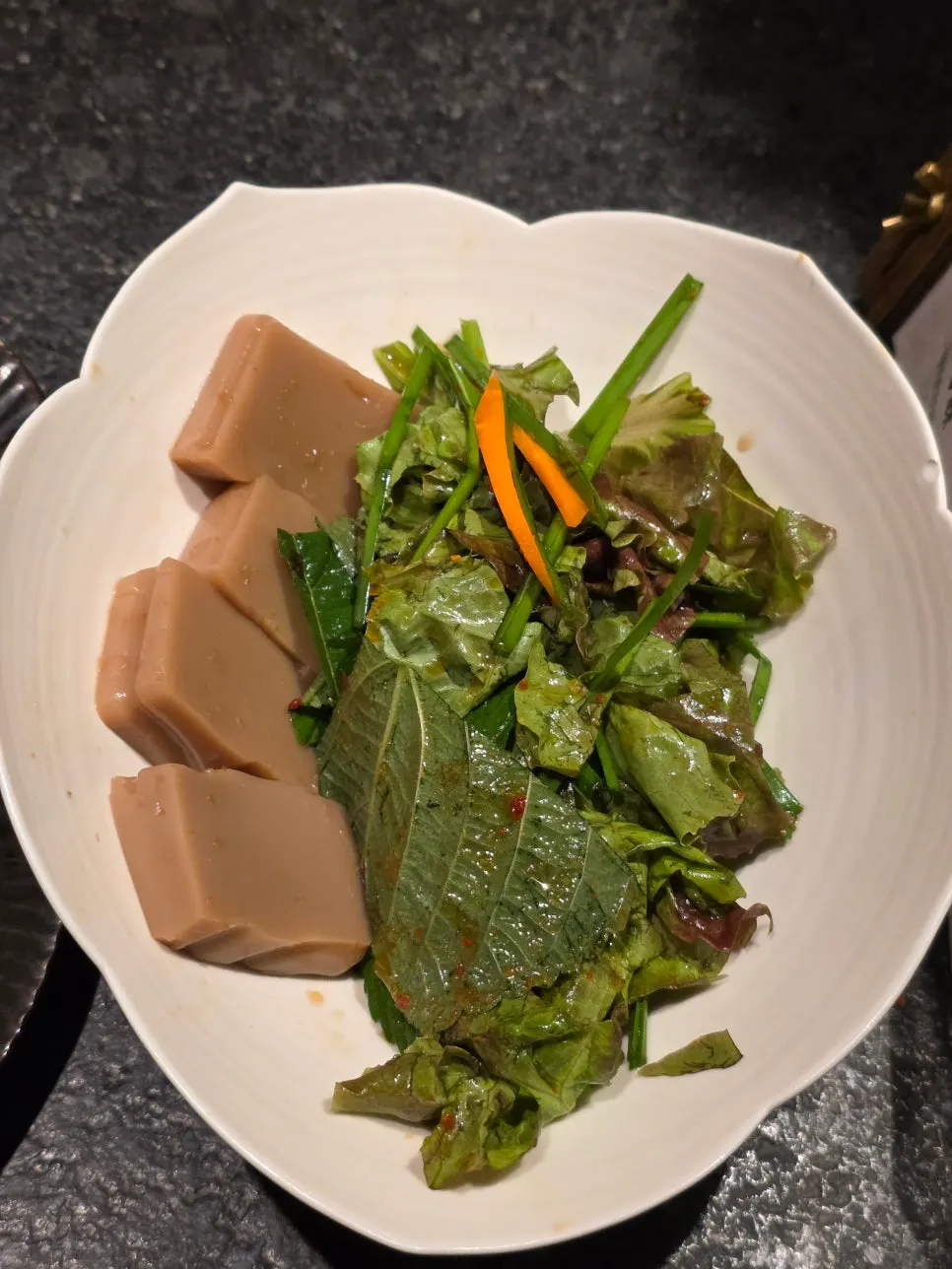 Neatly arranged banchan side dishes