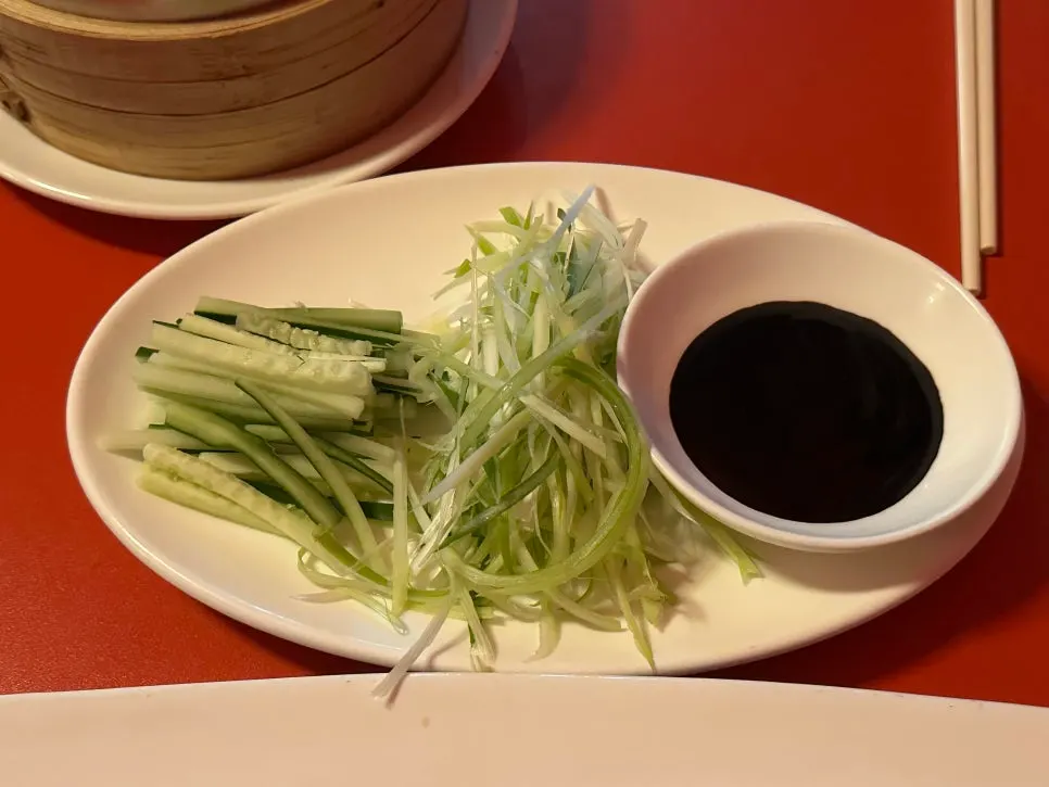 Shredded scallions and cucumber strips for Peking duck