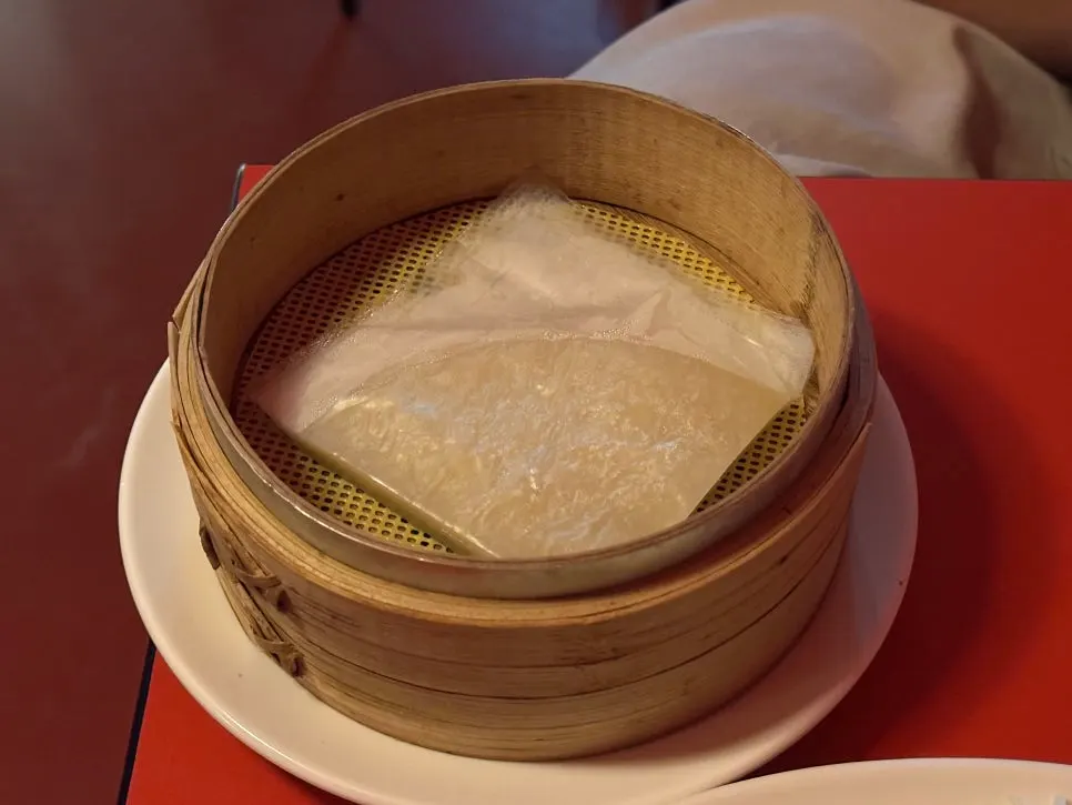 Individually wrapped wheat pancakes in a steamer