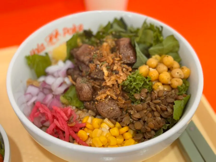 Steak poke cut into bite-sized pieces