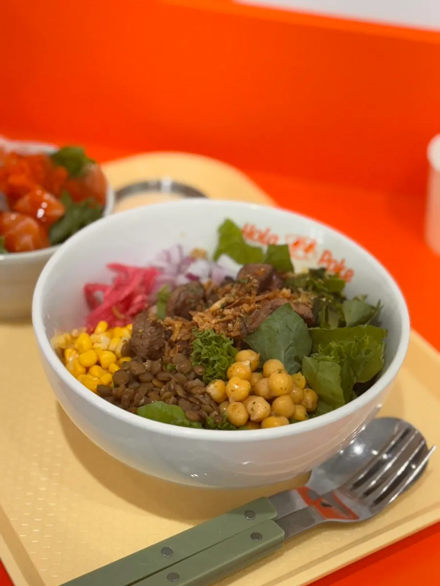 A bite of poke blended with truffle mayo sauce