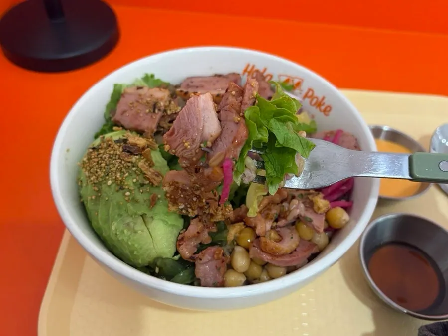 Poke with a salad and oat brown rice base