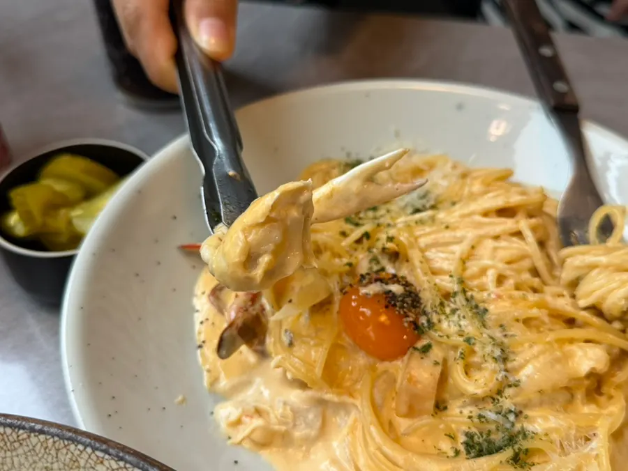 Crab meat mixed into the pasta