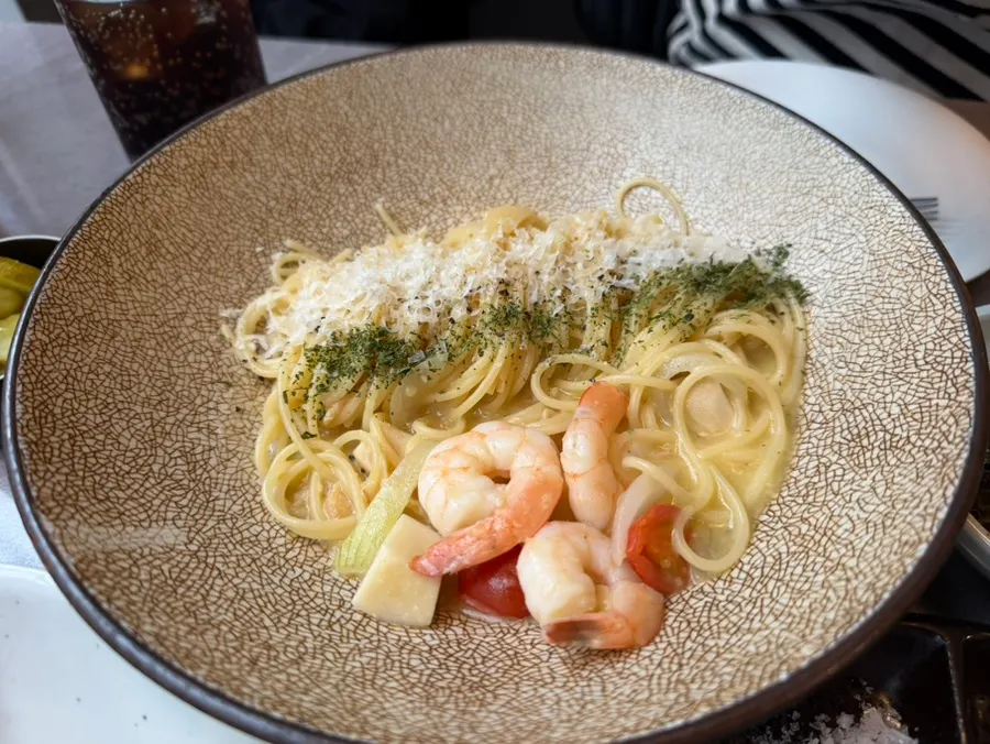 A plate of shrimp oil pasta
