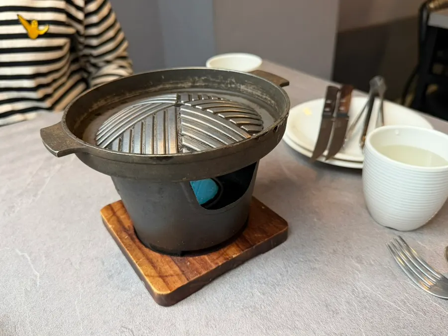 Tabletop grill set up for the steak