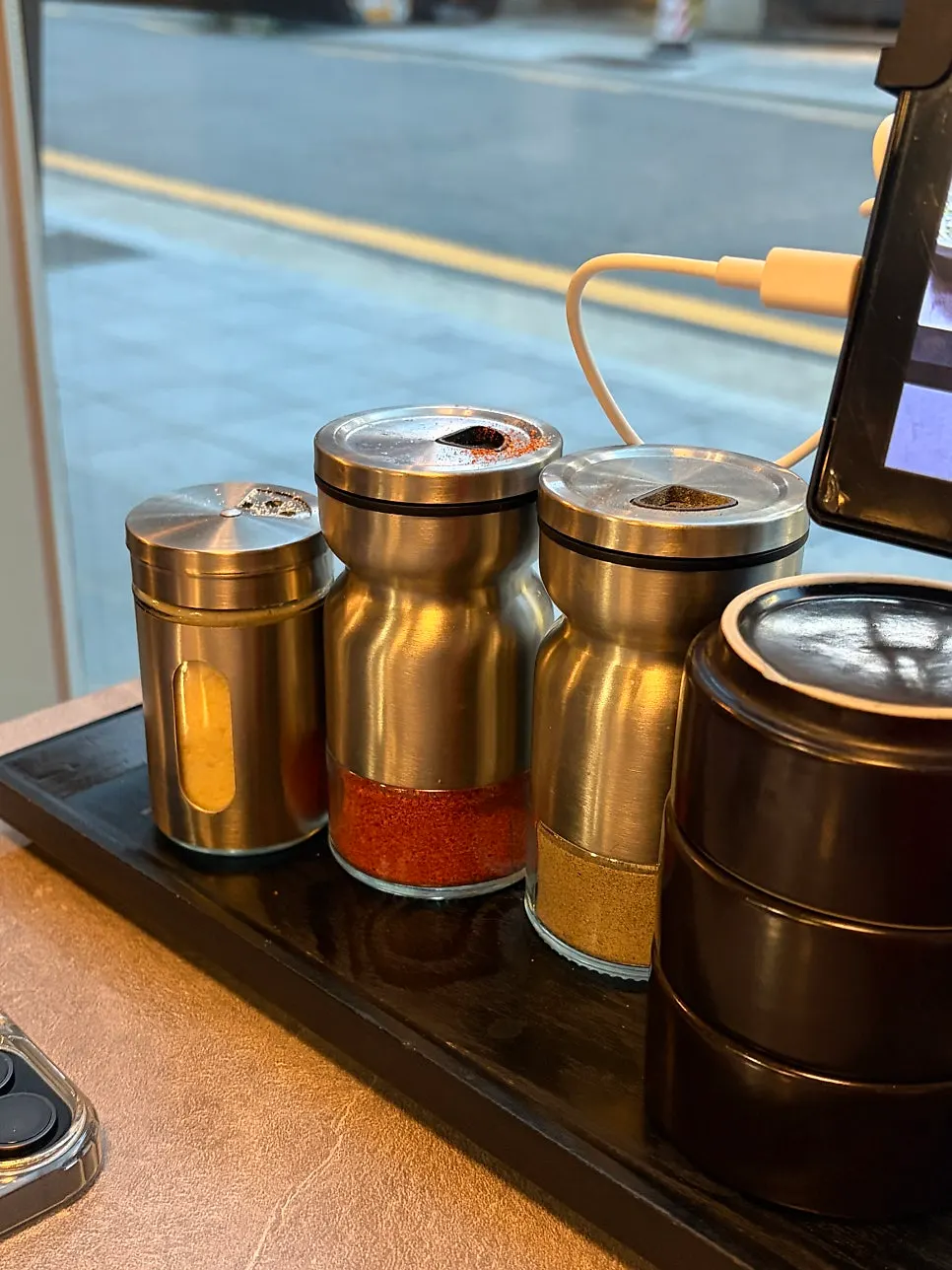 Seasonings set out at the table