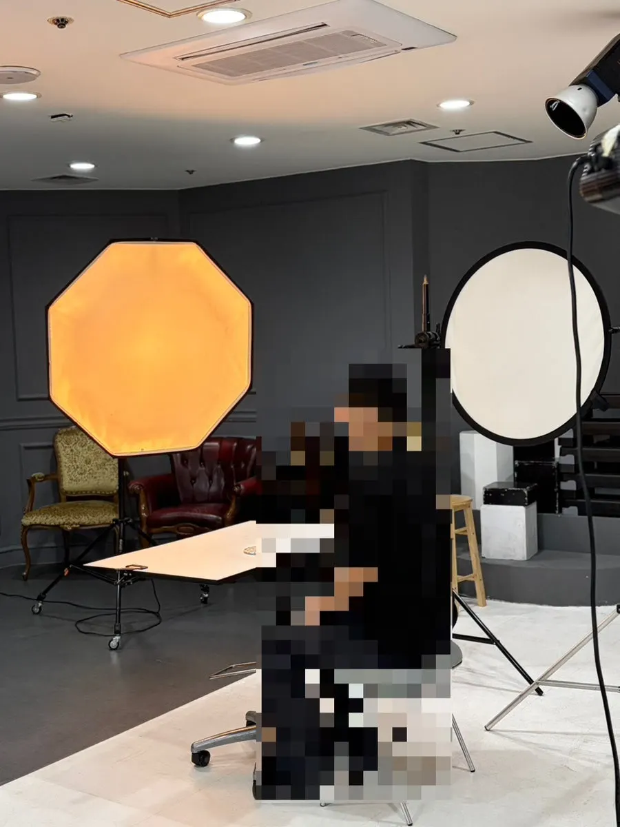 Shooting space with backdrop and camera set up