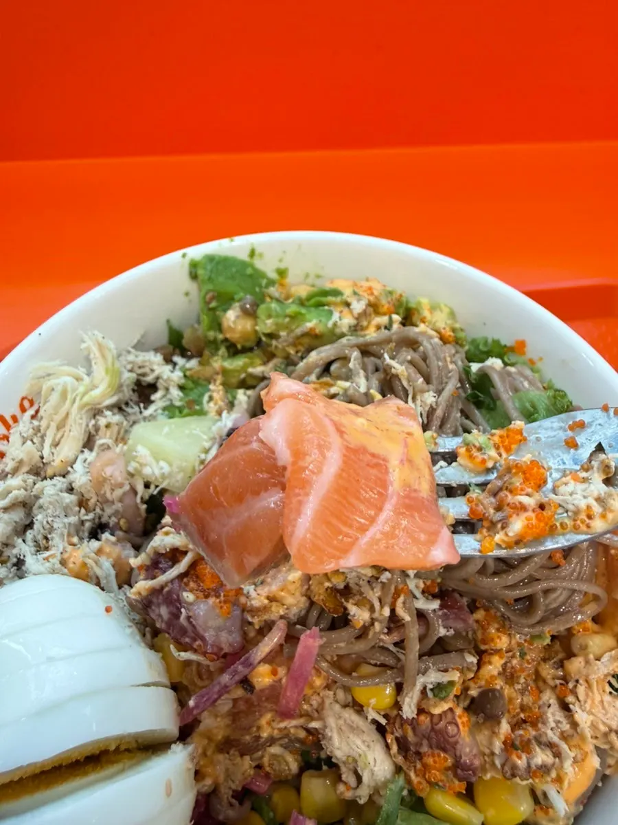 Octopus topping added to the poke