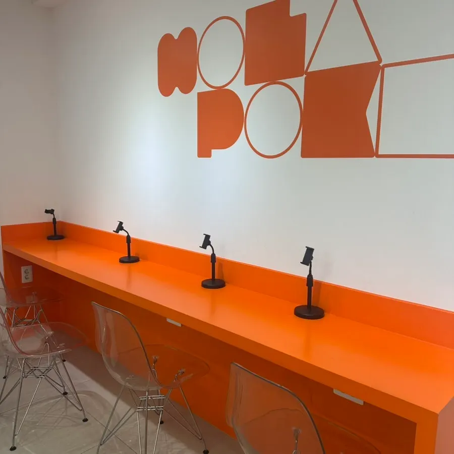 Interior seating area at Hola Poke