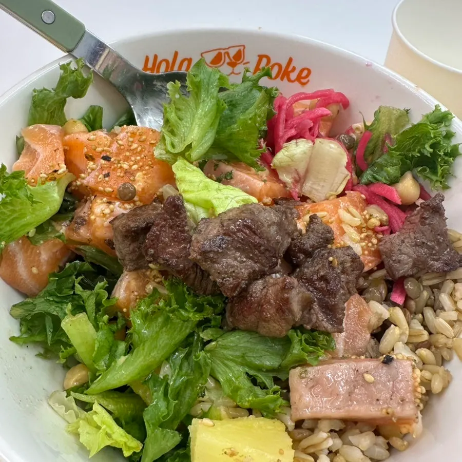 Thick salmon and tender flat iron steak toppings
