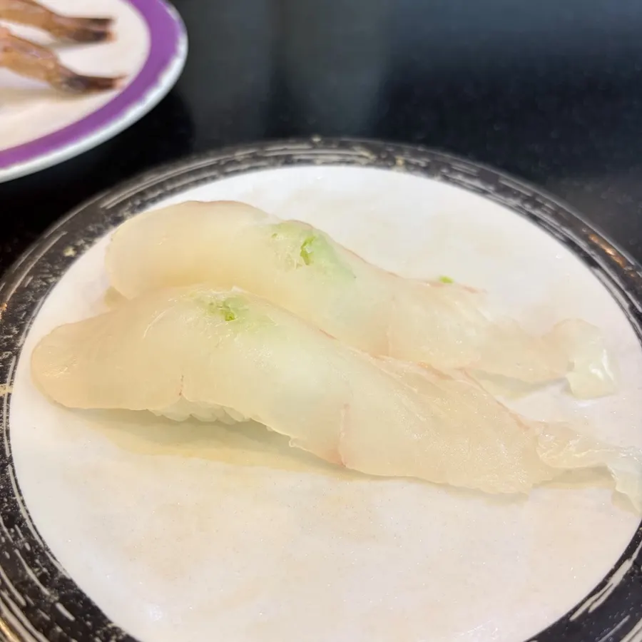 Plate of raw shrimp sushi