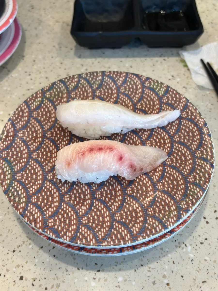 A plate of seasoned sea bream belly sushi