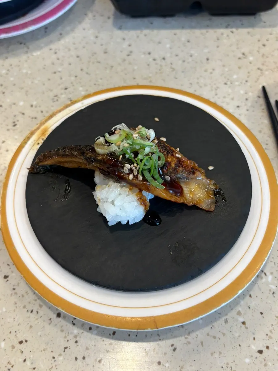 Sweet shrimp with sea urchin on laver sushi