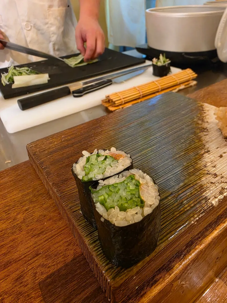 Shiso hosomaki rolled and served by the chef on the house