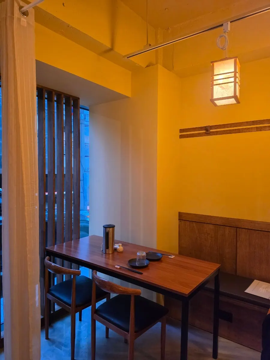 Window seats at Sakai looking out onto the street