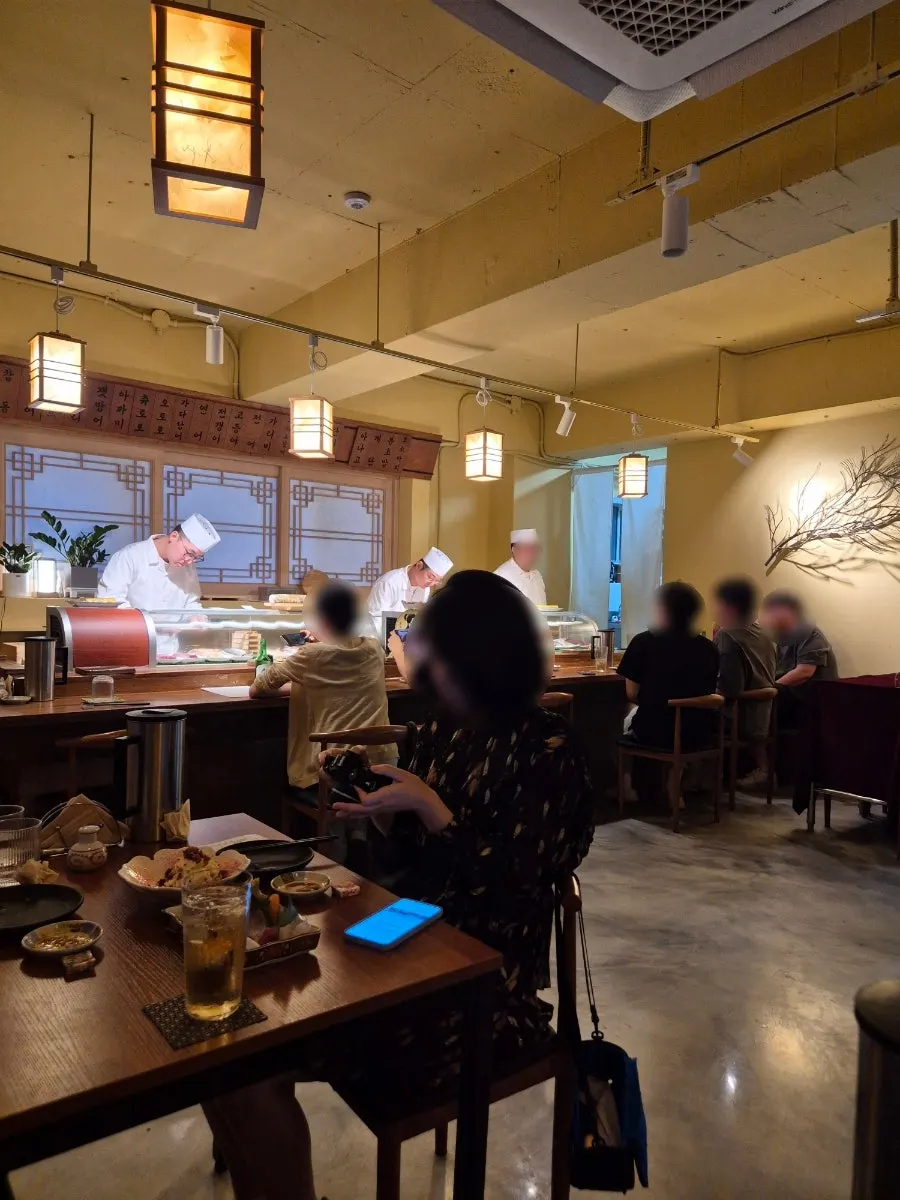 Sakai's chef and staff working in the open kitchen