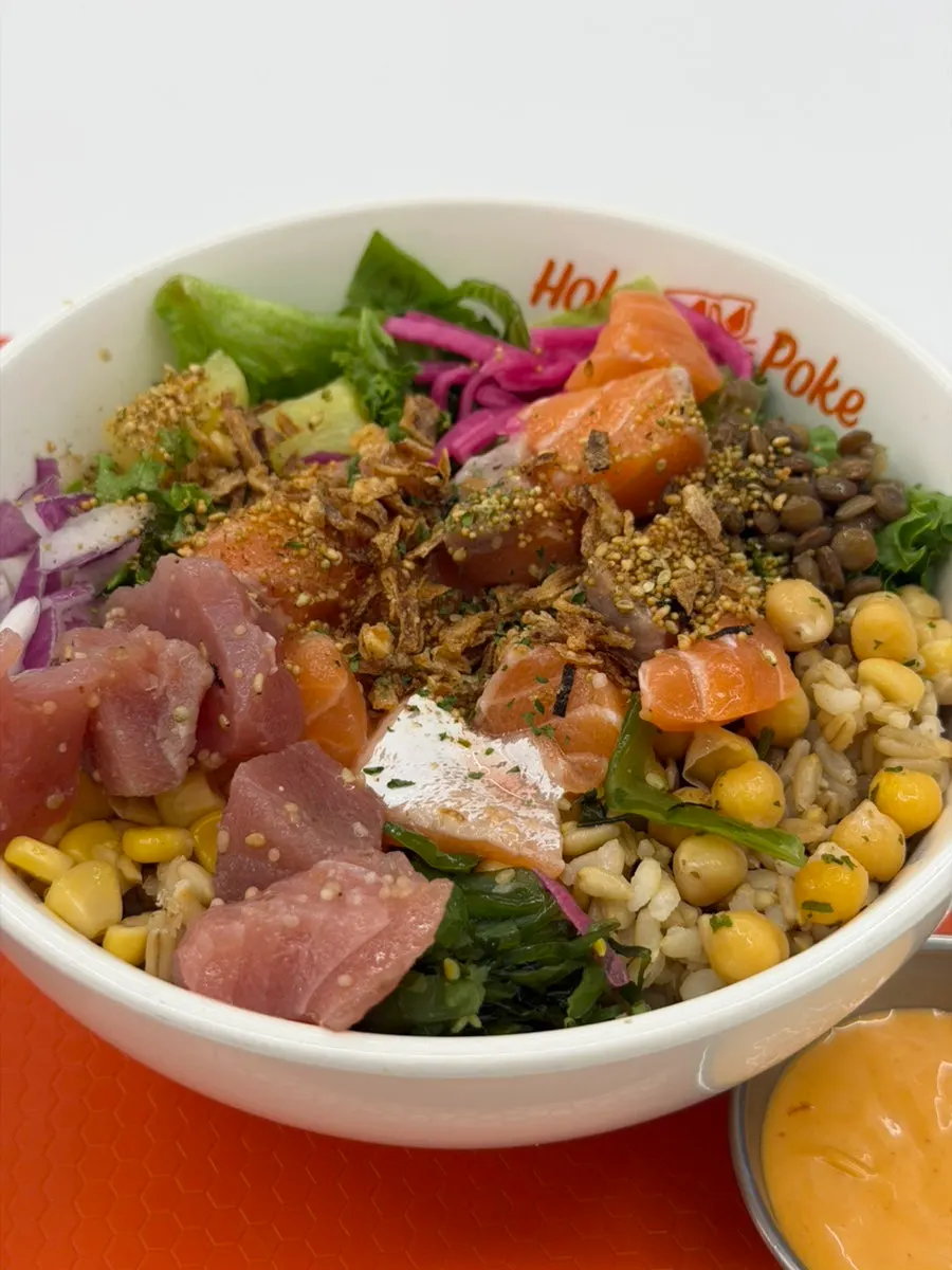 Fresh salmon poke with smoked duck and sriracha mayo