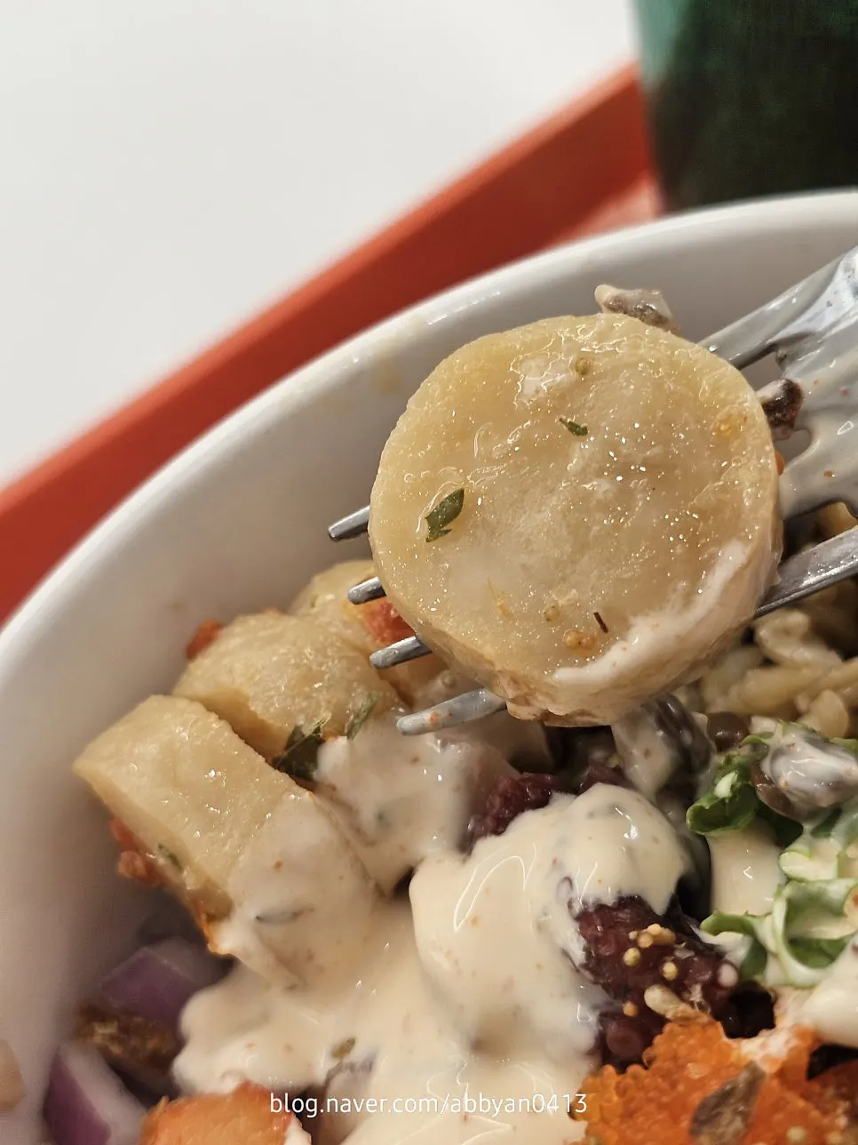 A spoonful of seafood poke