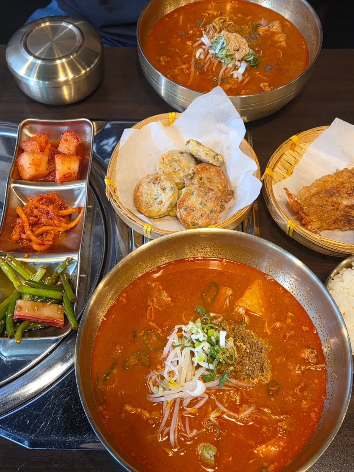 Boneless gamjatang served with shrimp pancake and seafood pancake