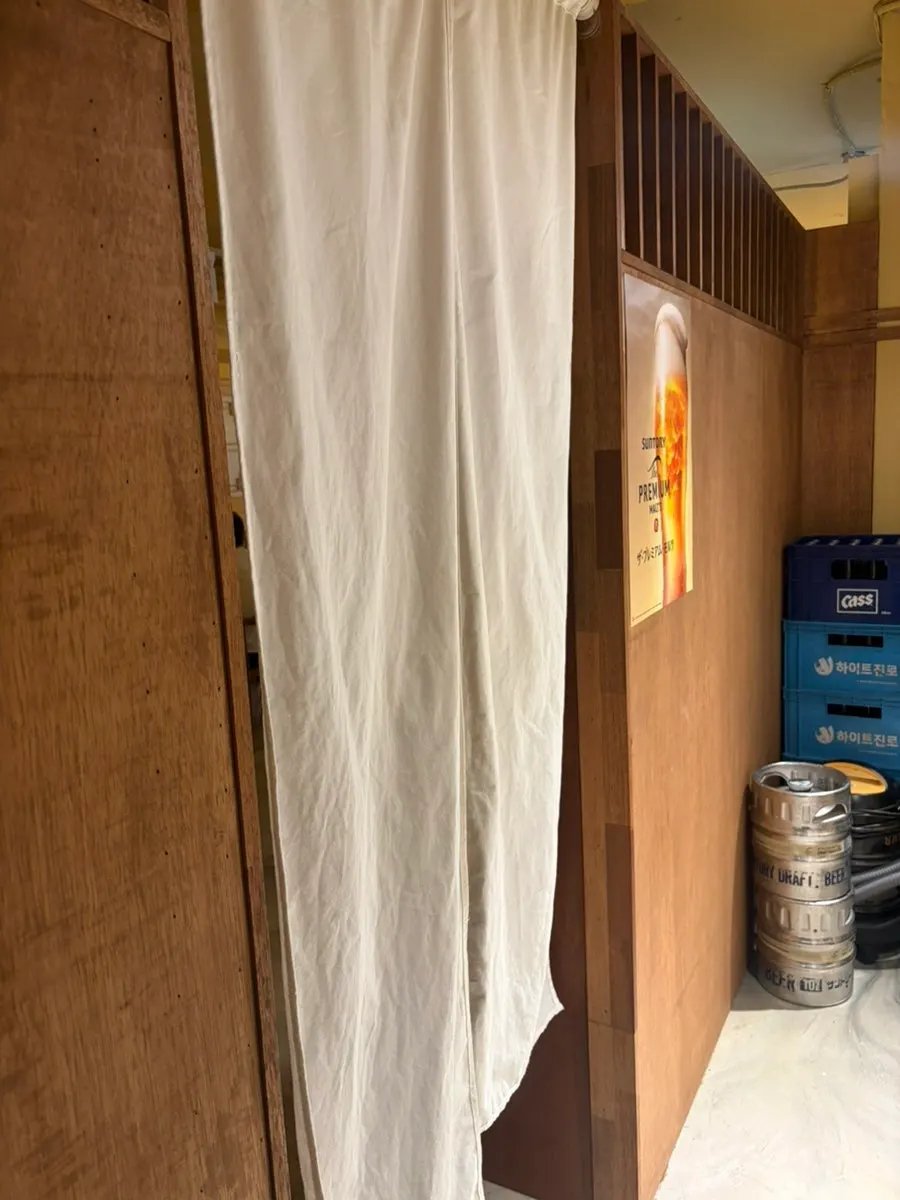 Sakai's curtained entrance with no signboard