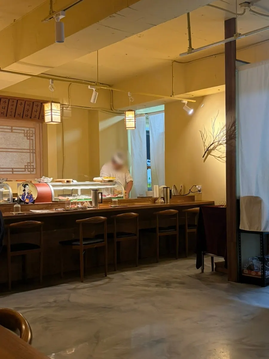 The izakaya hall filled with office workers