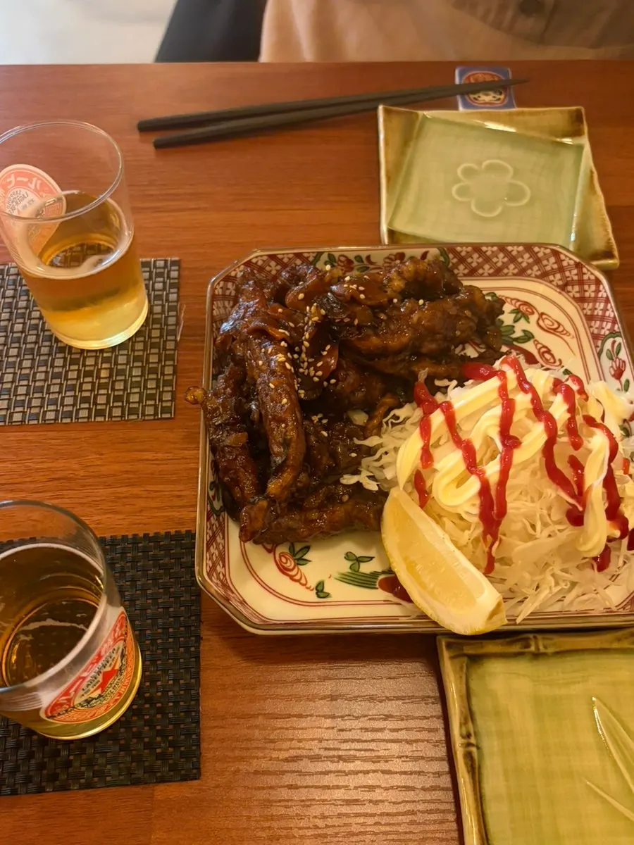 A cold beer ordered as a side drink