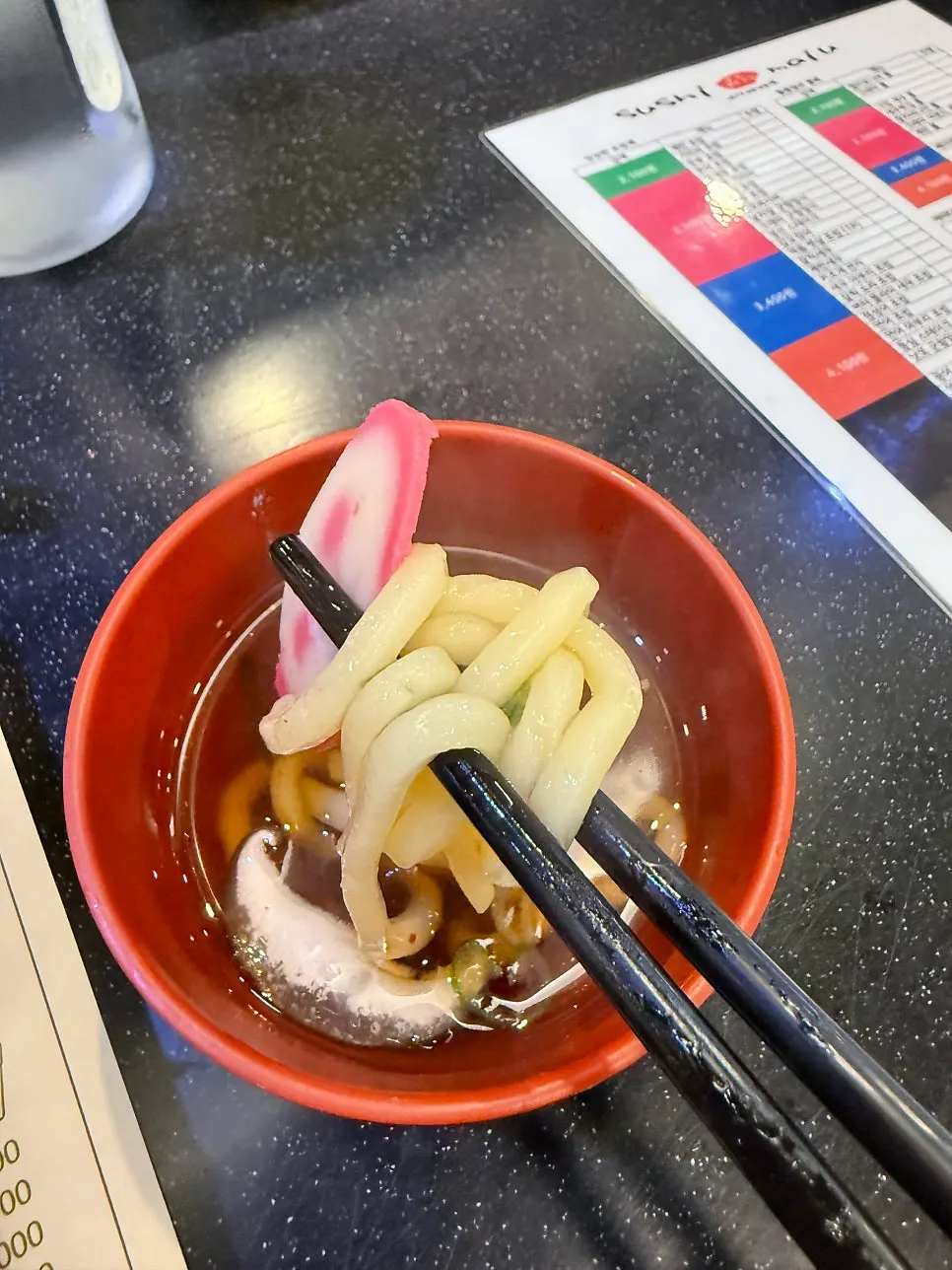 Small udon served alongside the sushi order